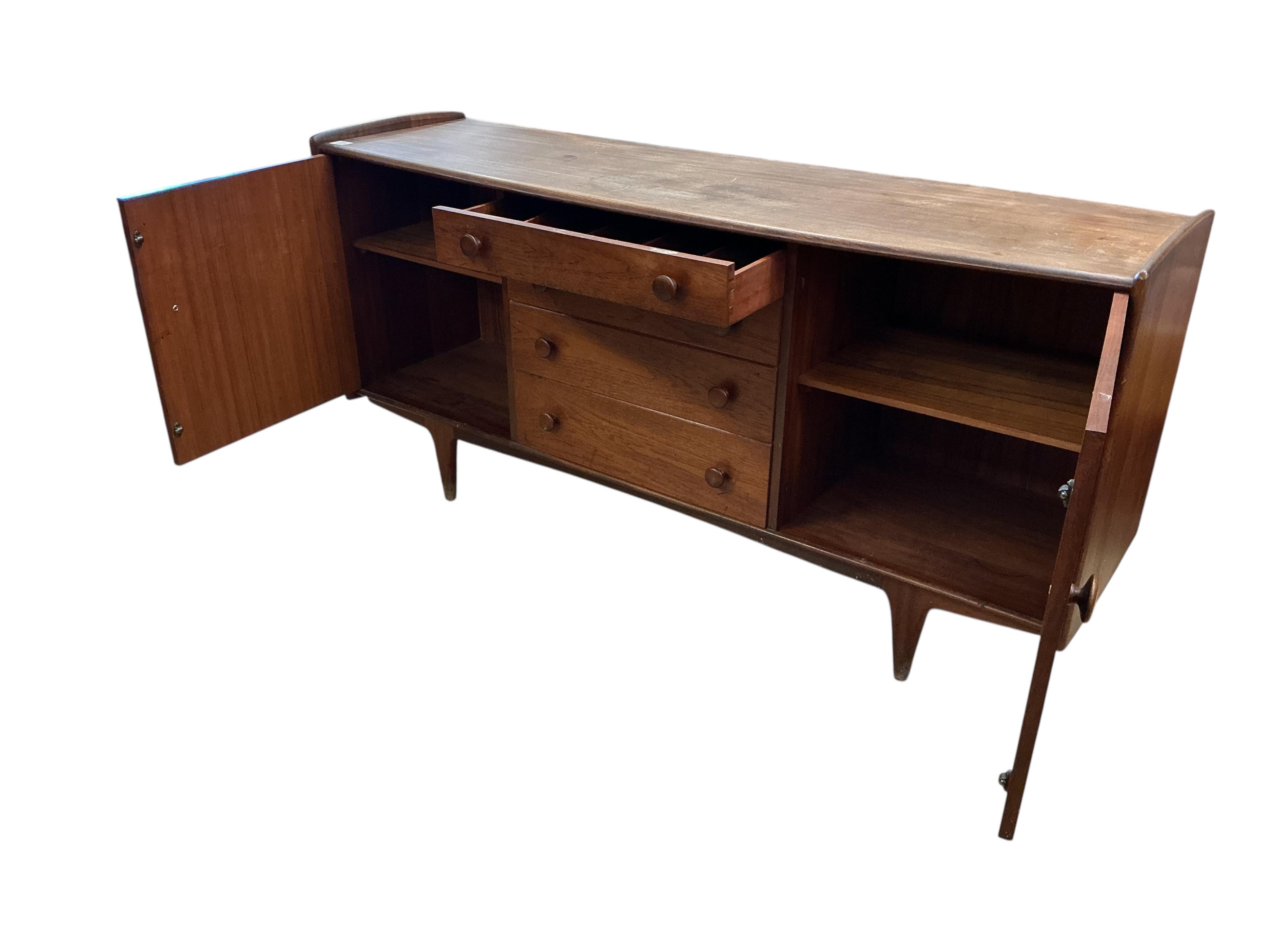John Herbert for Younger, a mid century 'Volnay' teak bowfront sideboard, width 168cm, depth 49cm, height 82cm
